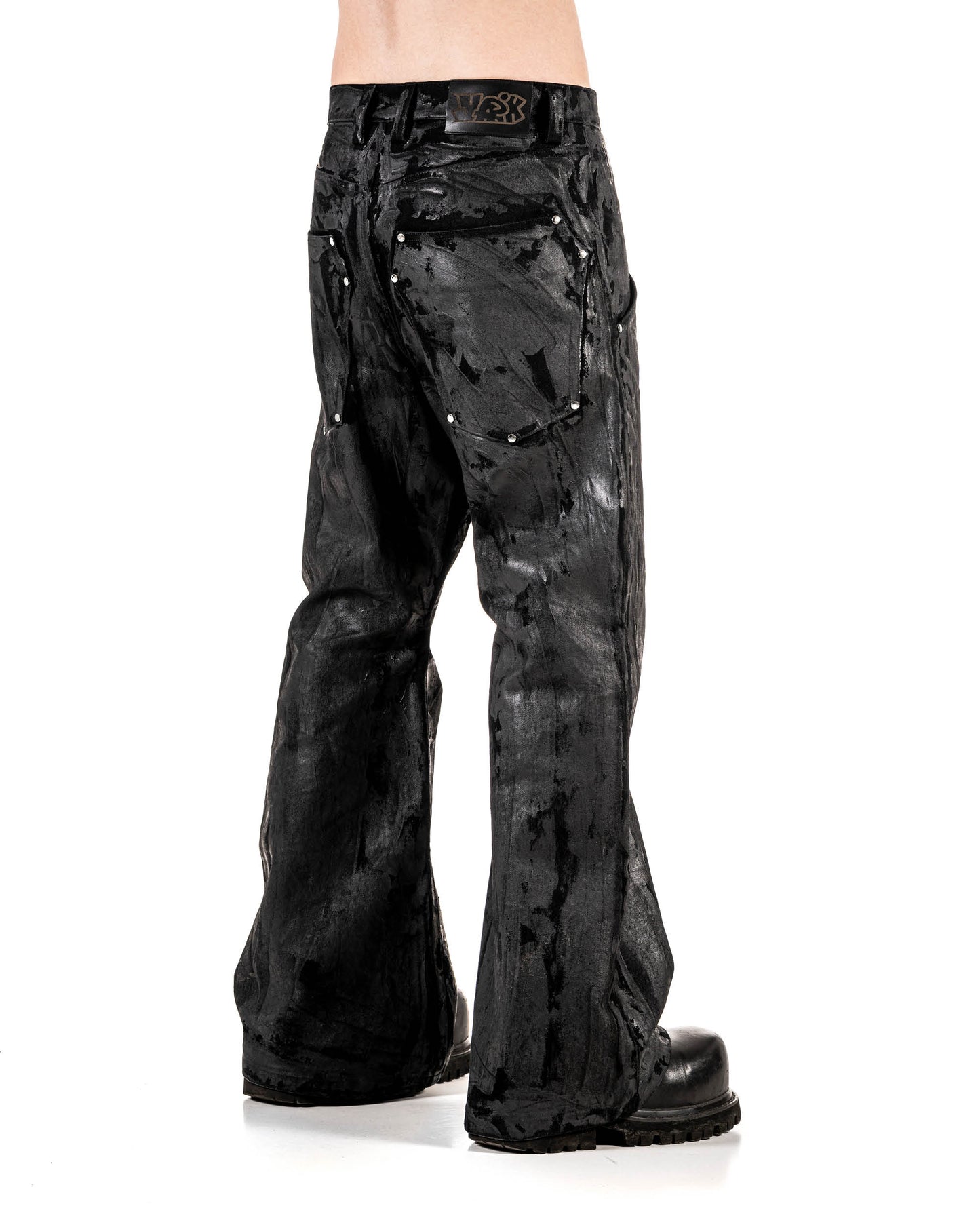 WAXED STUDDED FLARED JEANS